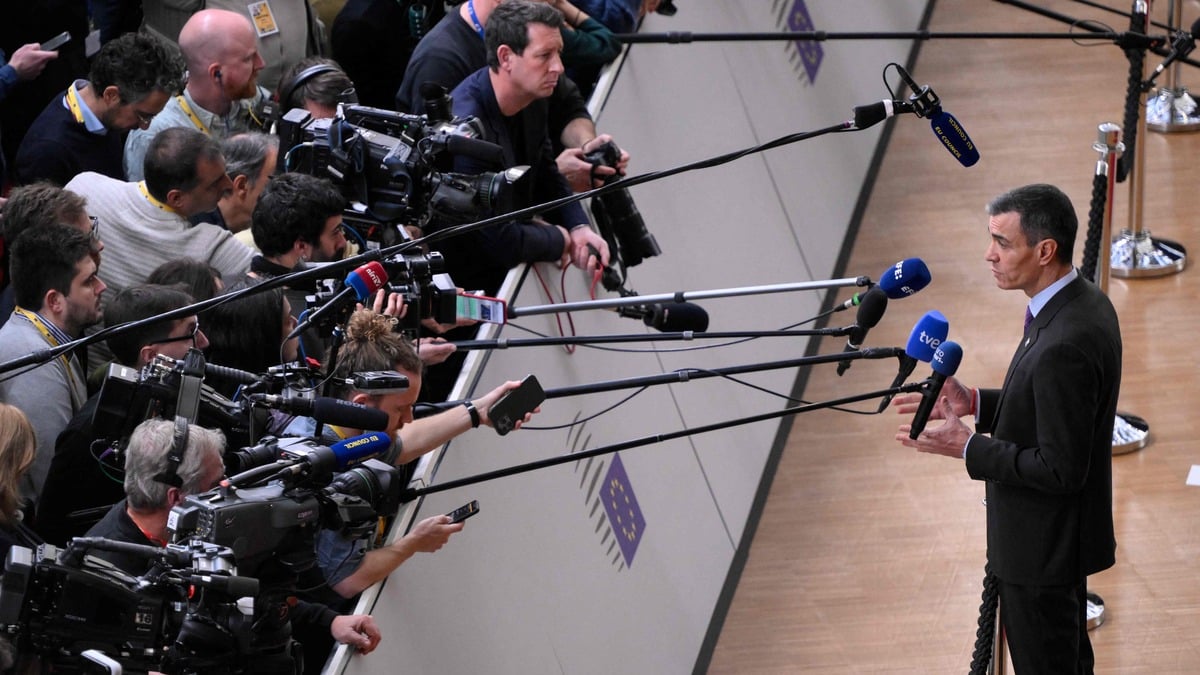 Spain's Prime Minister Pedro Sanchez, the Spanish prime minister, is seen speaking with press as he arrives for a European Council meeting in Brussels on 18 December 2025