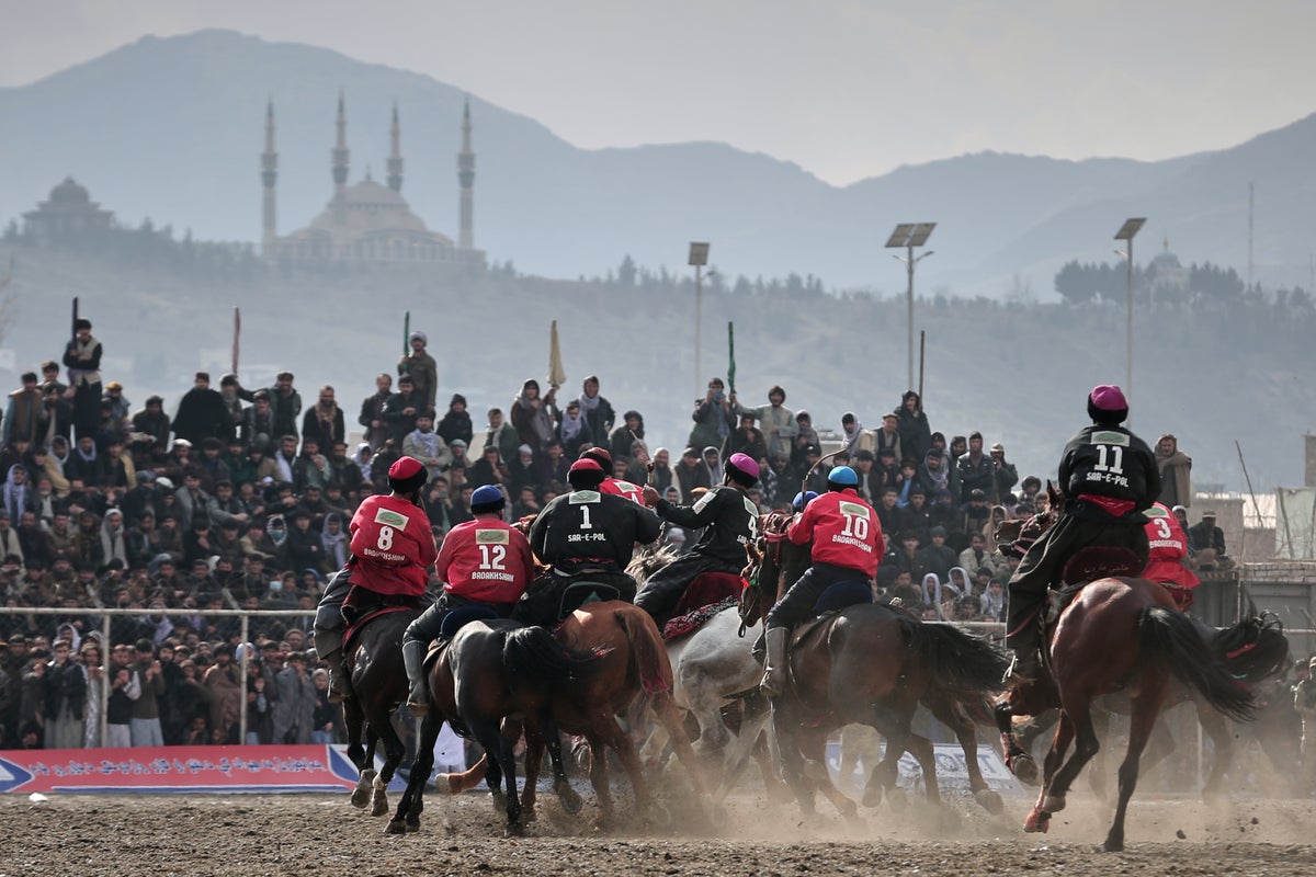 Thousands turn out in Kabul to cheer on Afghanistan's traditional buzkashi equestrian games