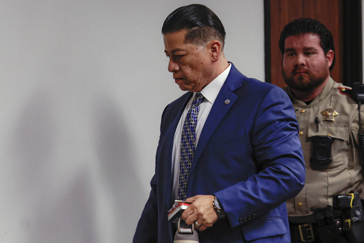Former Uvalde school district police officer Adrian Gonzales leaves the courtroom as the jury g ...