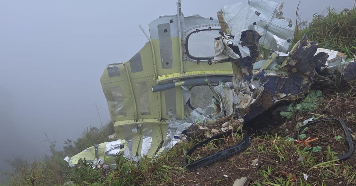 Indonesian rescuers find a body and wreckage of vanished plane