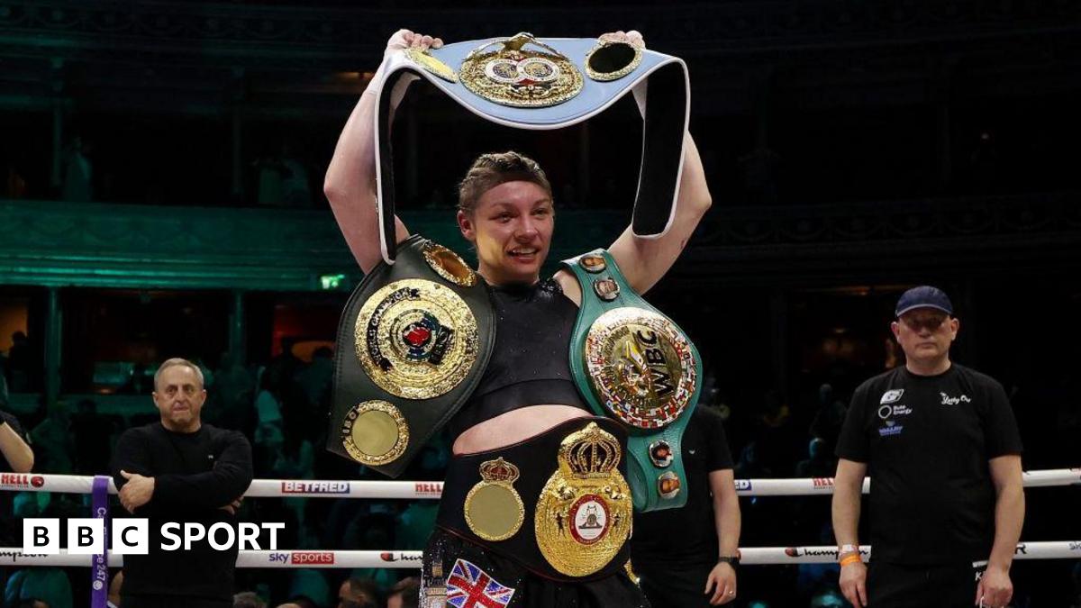 Lauren Price poses with her world titles after beating Natasha Jonas