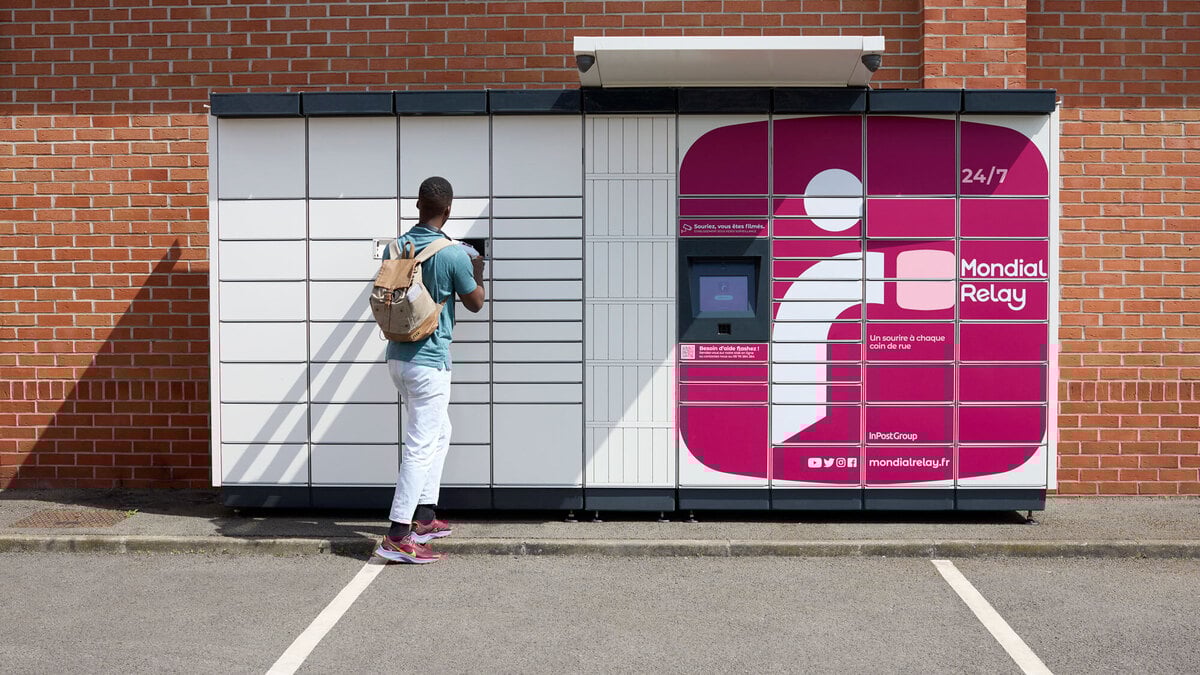 A man accesses a Mondial Relay automated parcel locker