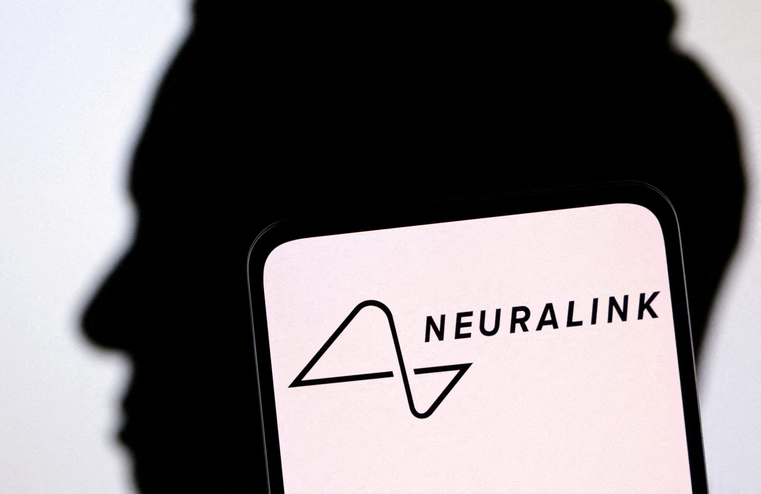 Neuralink plans ‘high-volume’ brain implant production by 2026, Musk says