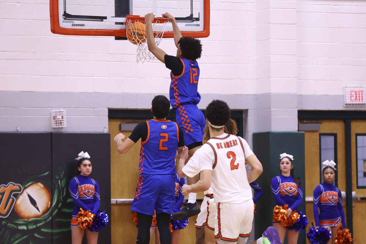 Bishop Gorman forward Braylen Williams (12) dunks the ball during a basketball game at Mojave H ...