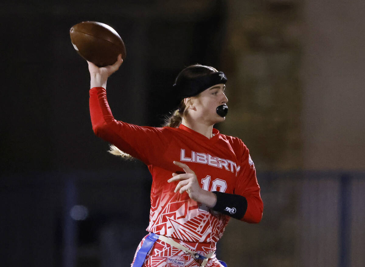 Liberty High's quarterback Charli Taylor (19) throws a pass against Bisho Gorman during th ...
