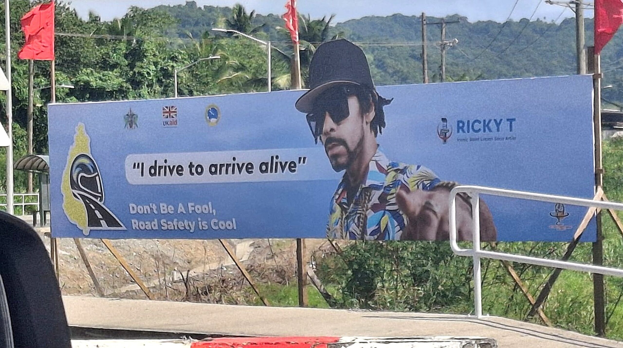 Road safety billboard vandalised - St. Lucia Times