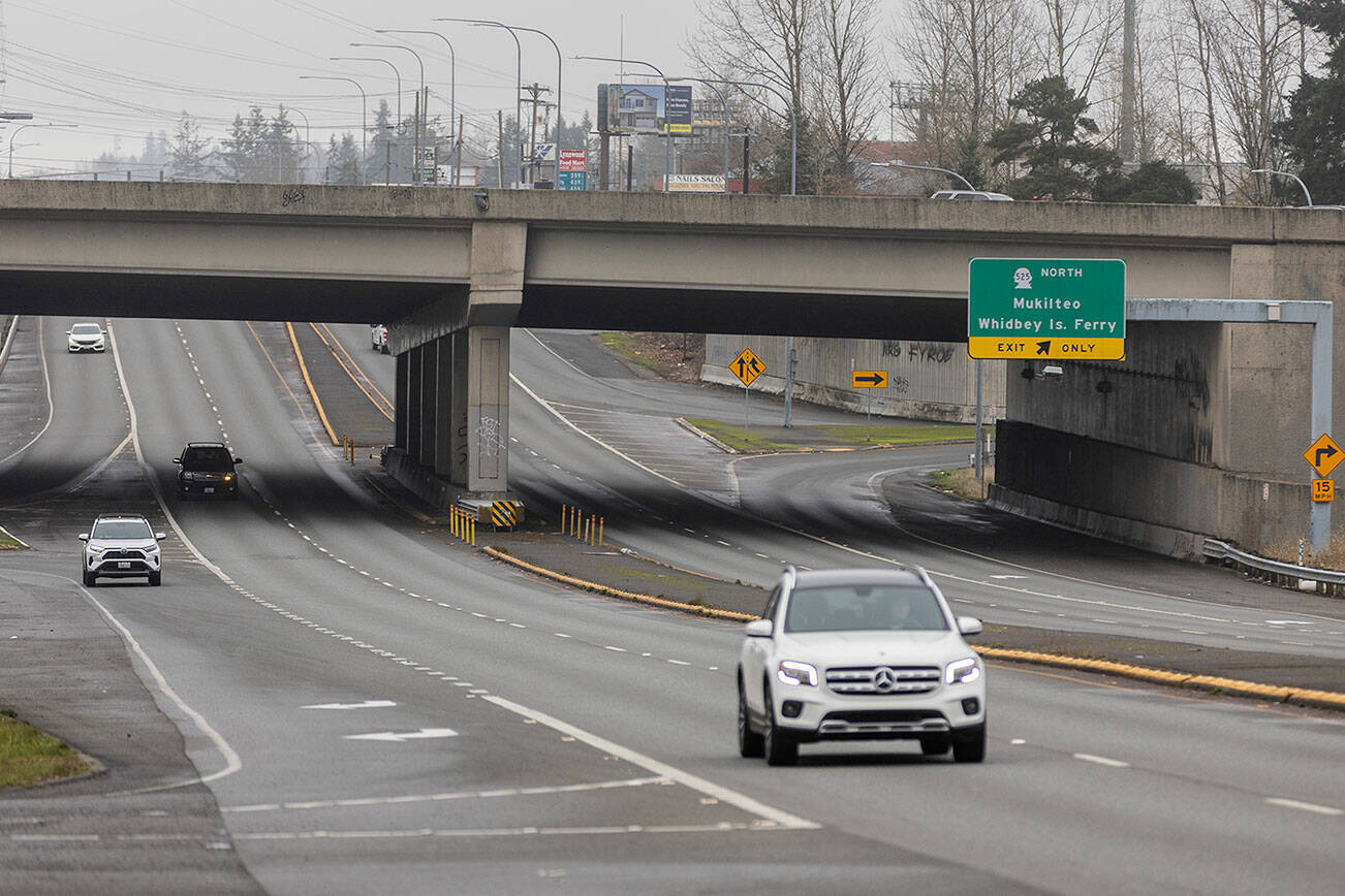 Debris shows the highest level the Snohomish River has reached on a flood level marker located along the base of the Todo Mexico building on First Street on Friday, Dec. 12, 2025 in Snohomish, Washington. (Olivia Vanni / The Herald)