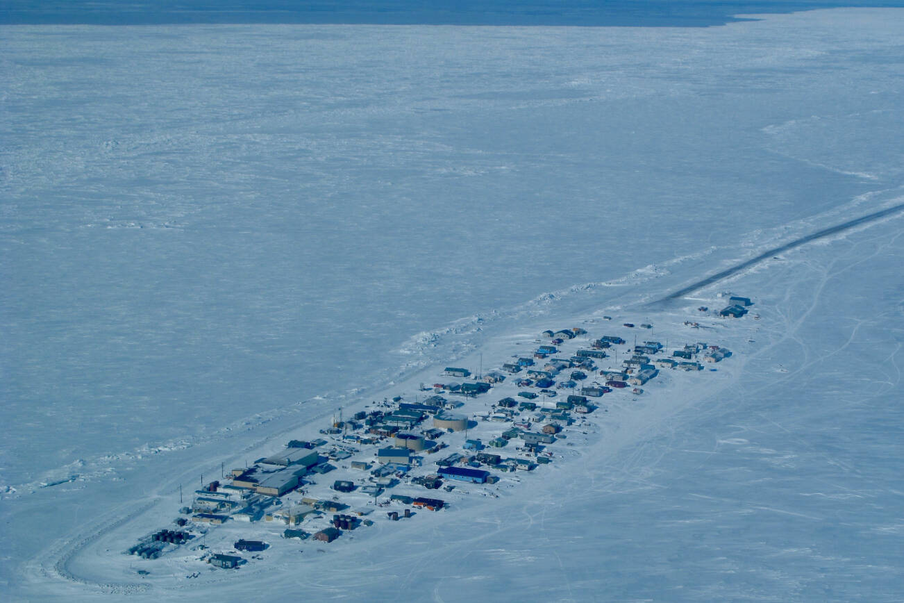 Northern sea ice, such as this surrounding the community of Kivalina, has declined dramatically in area and thickness over the last few decades. Photo courtesy Ned Rozell