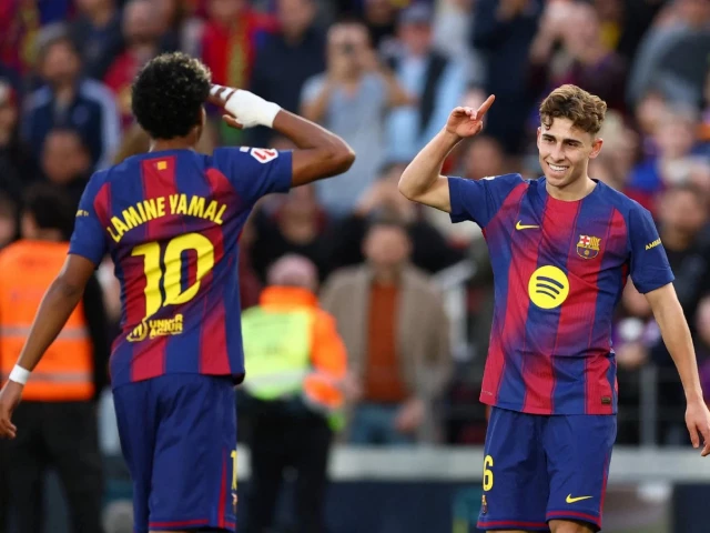 barcelona midfielder fermin lopez celebrates scoring his team s third goal in the comfortable win over levante on sunday in la liga photo afp
