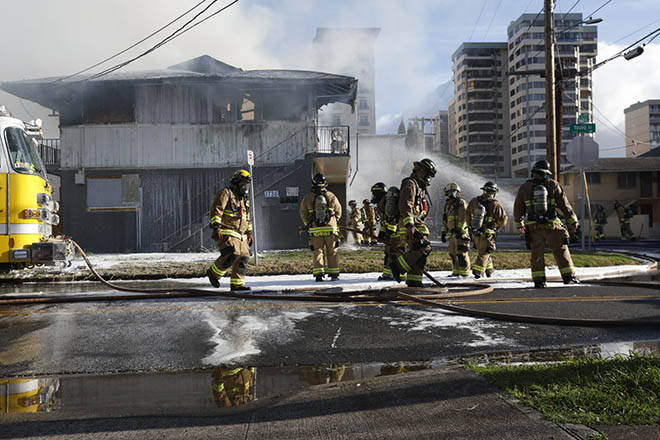 Firefighters extinguish 3-alarm blaze at Young Street apartment ...