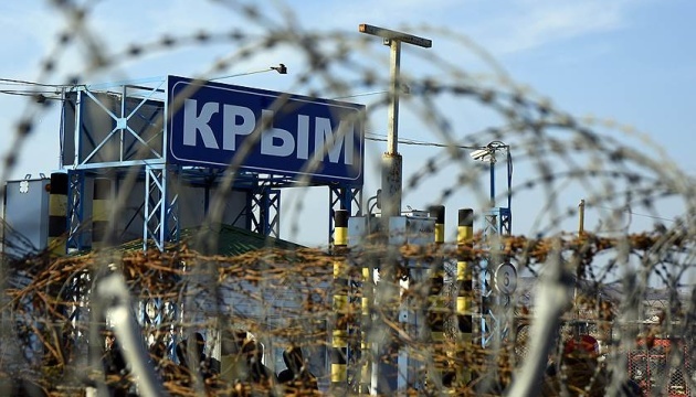 Occupiers in Crimea seek fines for covering face in public places
