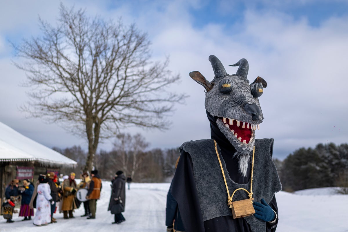 Photos show masked revelers celebrating Shrovetide in Lithuania