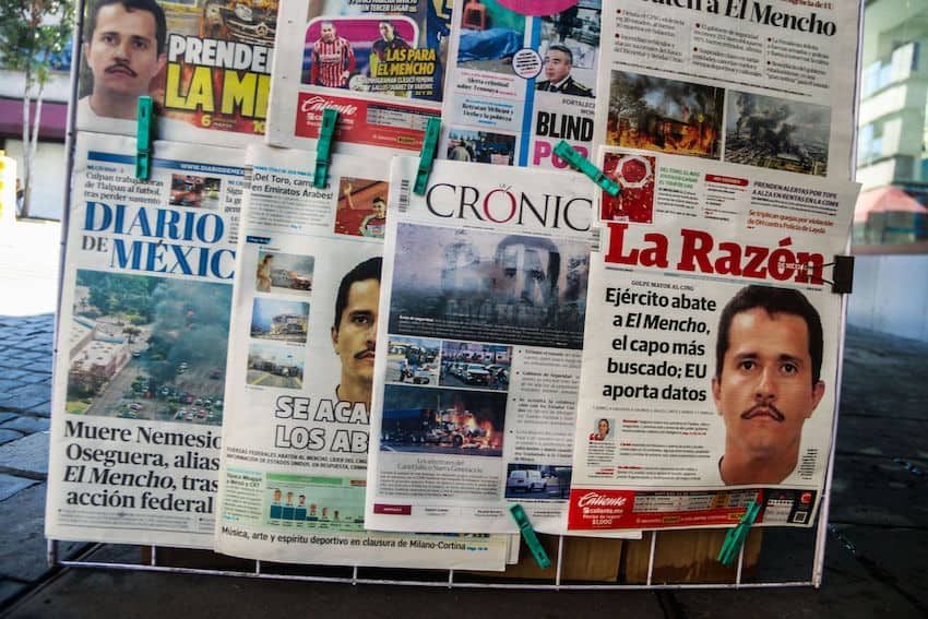 newspapers with El Mencho's face on the front page