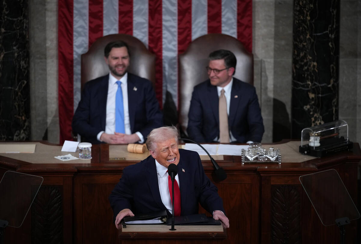 U.S. President Donald Trump, with Vice President JD Vance, left, and Speaker of the House Mike ...