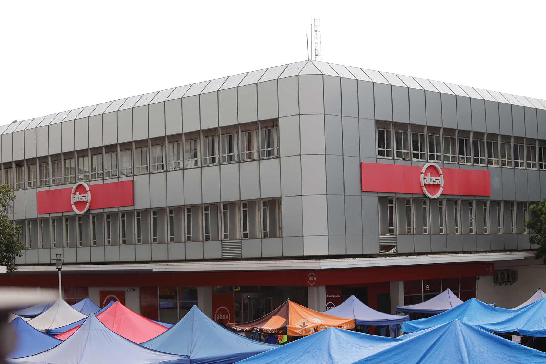 Absa warns 2025 profit to fall as costs and impairments rise