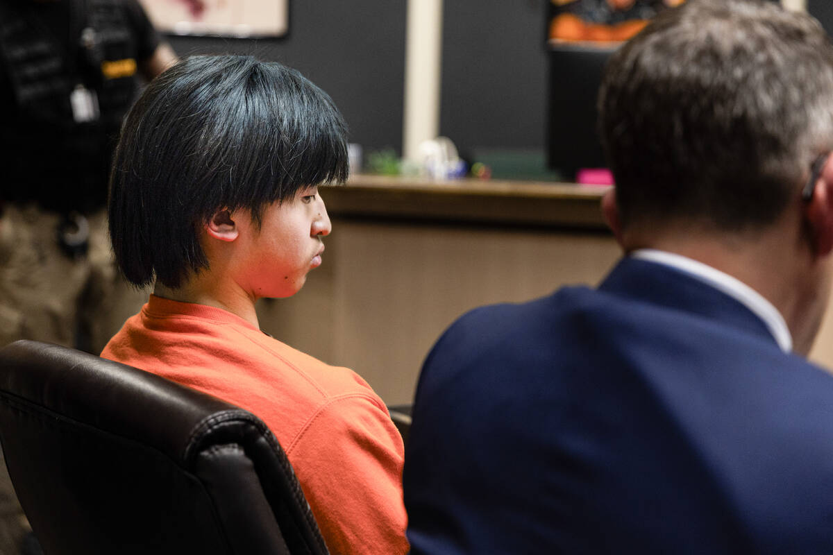 Dominic Kim, a teen suspect in the Alexander Dawson School sexual assault case, looks on during ...