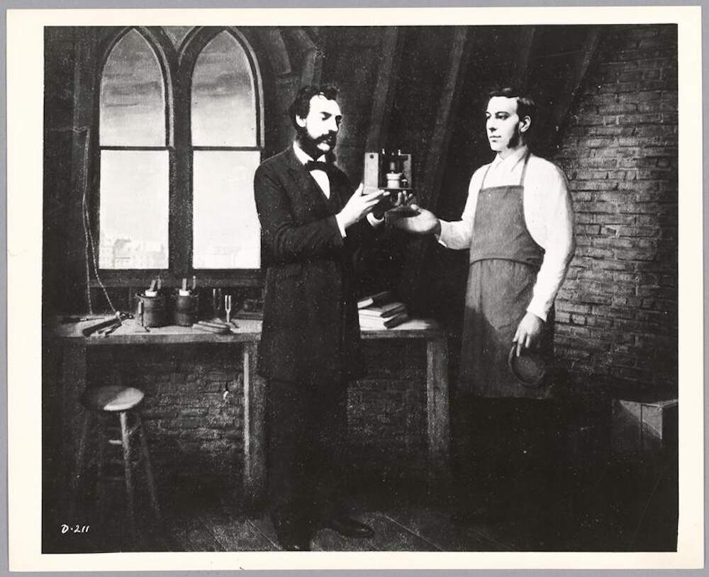 A 1875 sketch by an unknown artist of Alexander Graham Bell and Thomas Watson conducting experiments. (Courtesy MIT Museum)