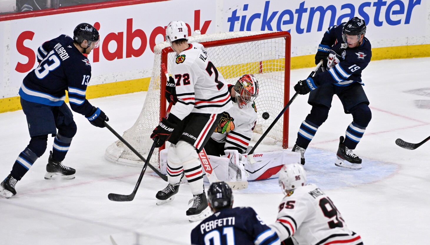 Blackhawks allow another critical late goal, lose to Jets in overtime