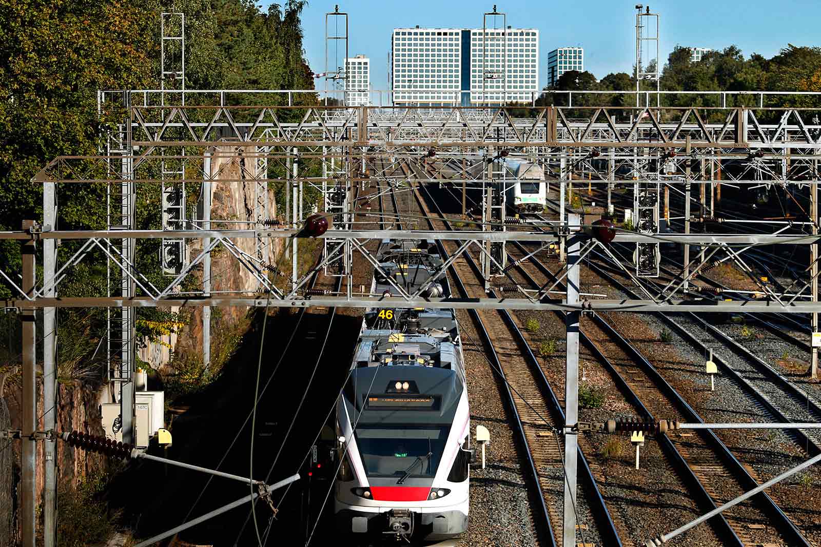 A photograph of trains taken from above, showcasing the electrical system in a photograph by Tony Öhberg for Finland Today.