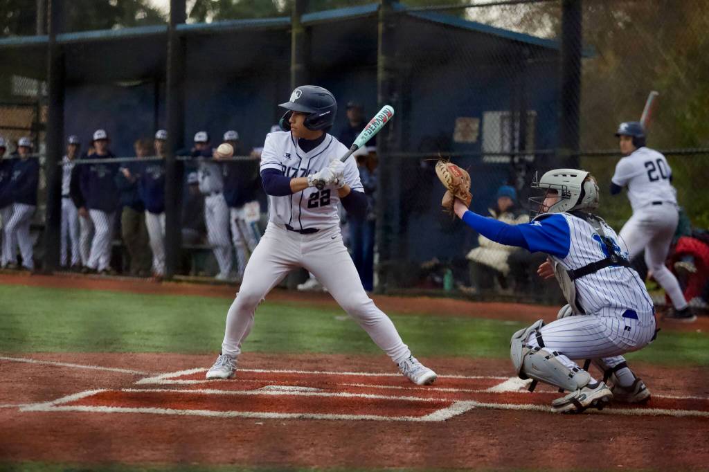 Glacier Peak senior Atticus Quist watches a pitch go by during the Grizzlies 6-2 win against Shorewood at Meridian Park Field on March 16, 2026. (Joe Pohoryles / The Herald)