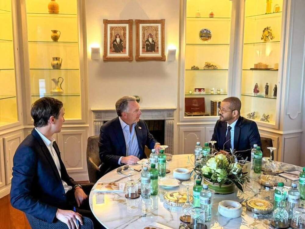 Oman's Minister of Foreign Affairs Sayyid Badr bin Hamad Al Busaidi, right, holds a meeting with White House special envoy Steve Witkoff, center, and  Jared Kushner, as part of the ongoing Iranian-American negotiations, in Geneva, Thursday Feb. 26, 2026. (Foreign Ministry of Oman via AP)