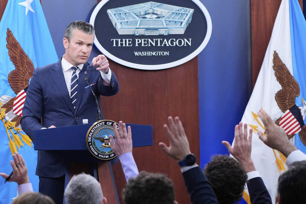 Defense Secretary Pete Hegseth calls on reporters for questions during a news conference at the Pentagon in Washington, Sunday, June 22, 2025, after the U.S. military struck three sites in Iran, directly joining Israel's effort to destroy the country's nuclear program. (AP Photo/Alex Brandon)