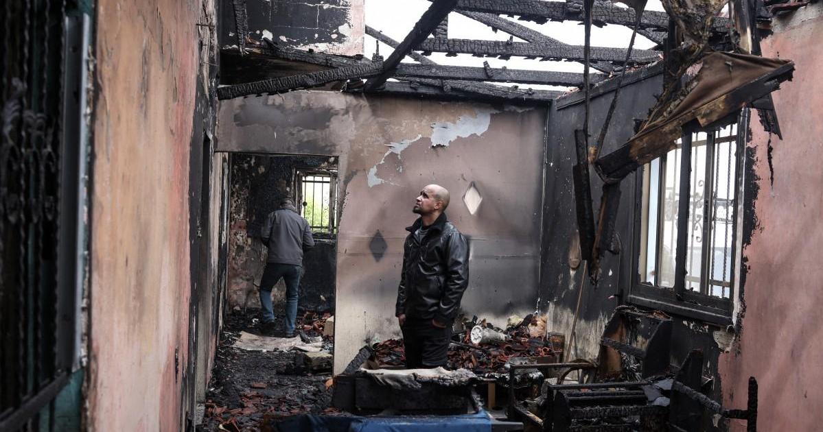 Israeli settlers burn buildings in attacks on West Bank villages