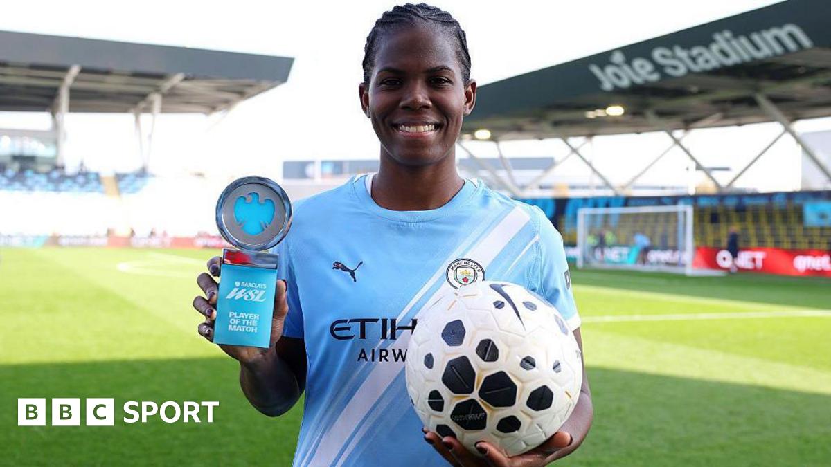 Khadija Shaw poses with the matchball and player of the match trophy