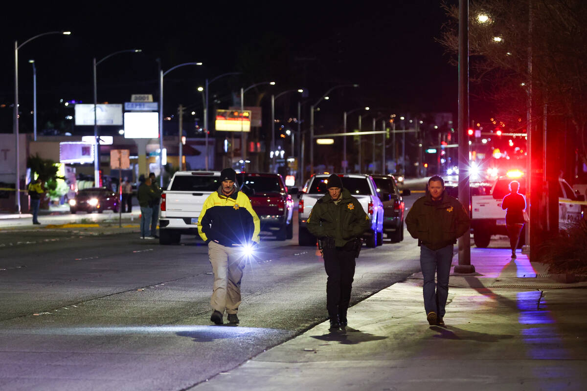 Las Vegas police investigate the scene where a 10-year-old, later identified as Simeon Young, w ...