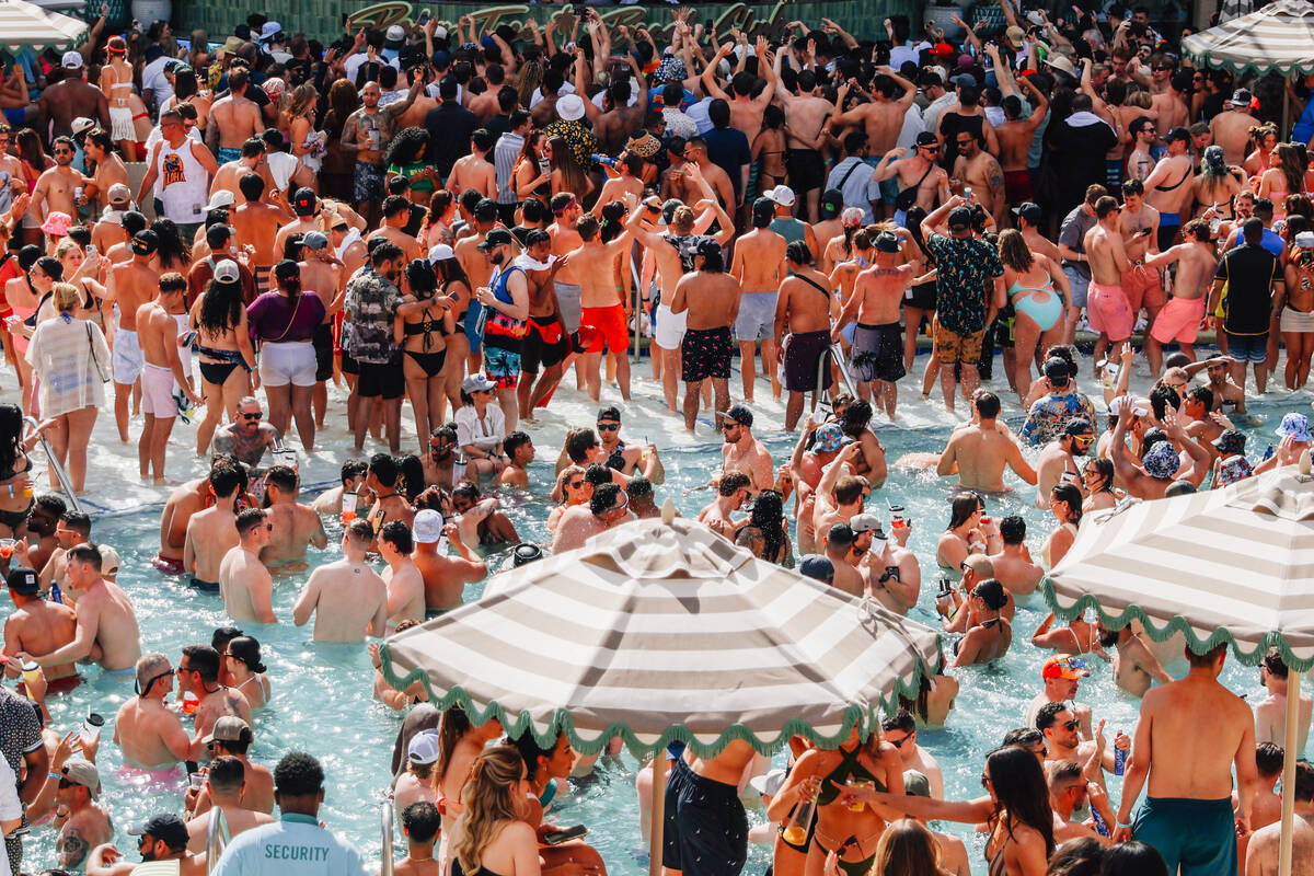 Partiers take to the pool at the Palm Tree Beach Club Saturday, May 10, 2025, in Las Vegas. (Ma ...