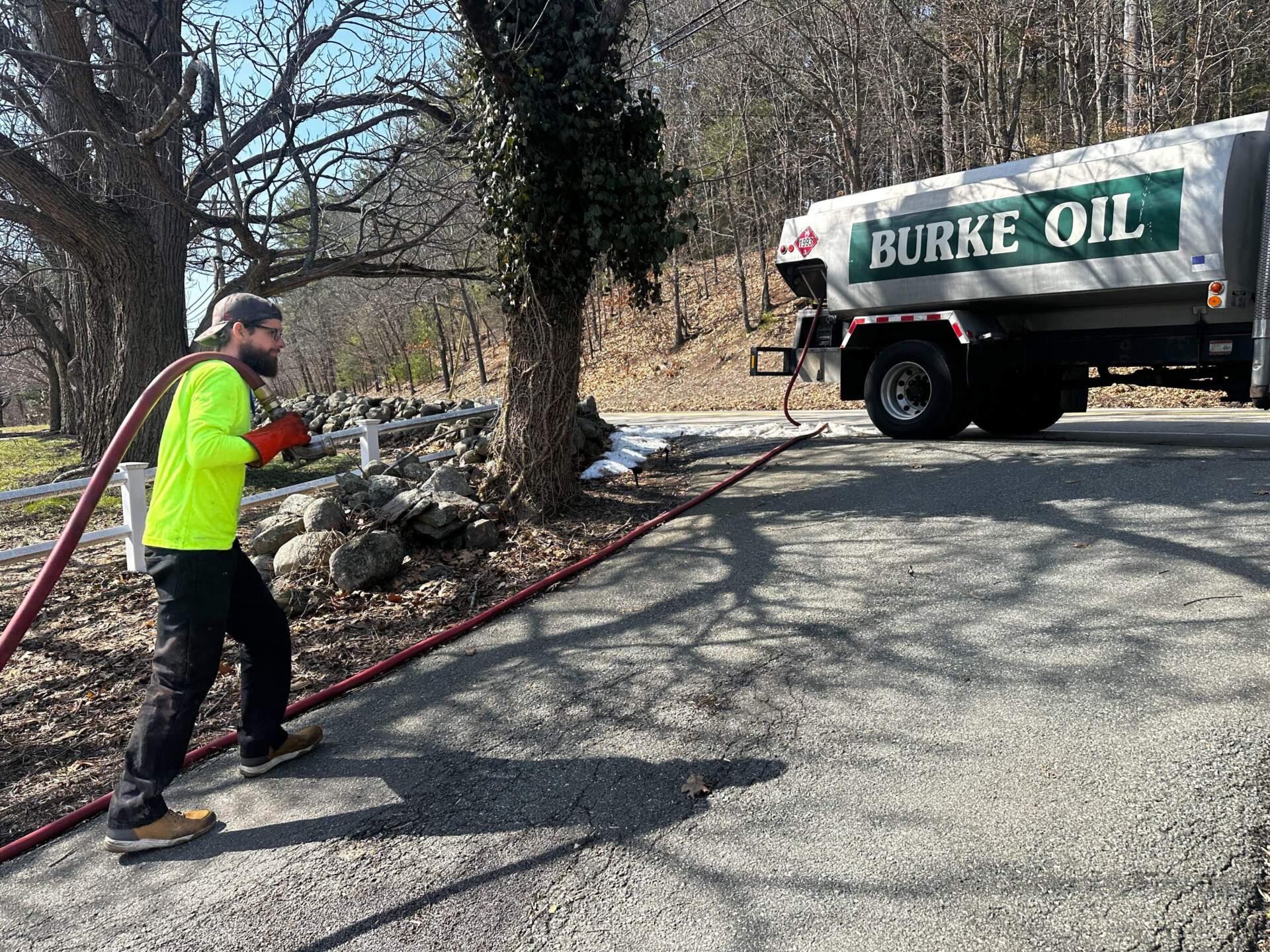 Fuel oil is delivered to a home in Massachusetts. (Simón Rios/WBUR)