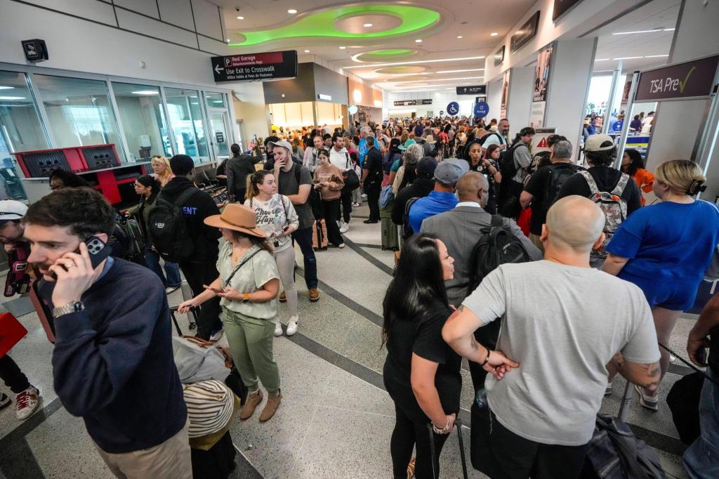Travelers encounter long waits at some airports due to DHS shutdown