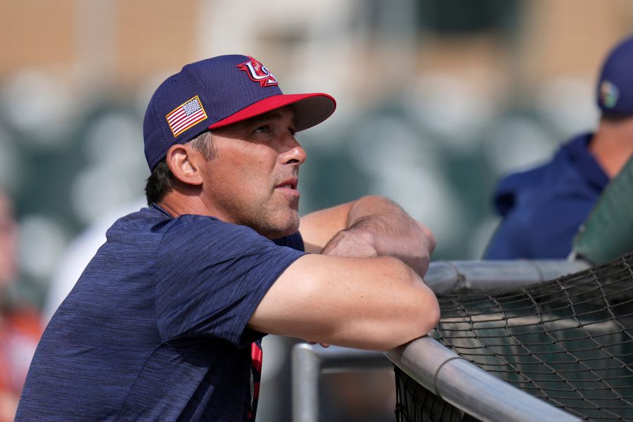 United States manager Mark DeRosa watches batting practice prior to an exhibition baseball game against the Colorado Rockies Wednesday, March 4, 2026, in Scottsdale, Ariz. (AP Photo/Ross D. Franklin)