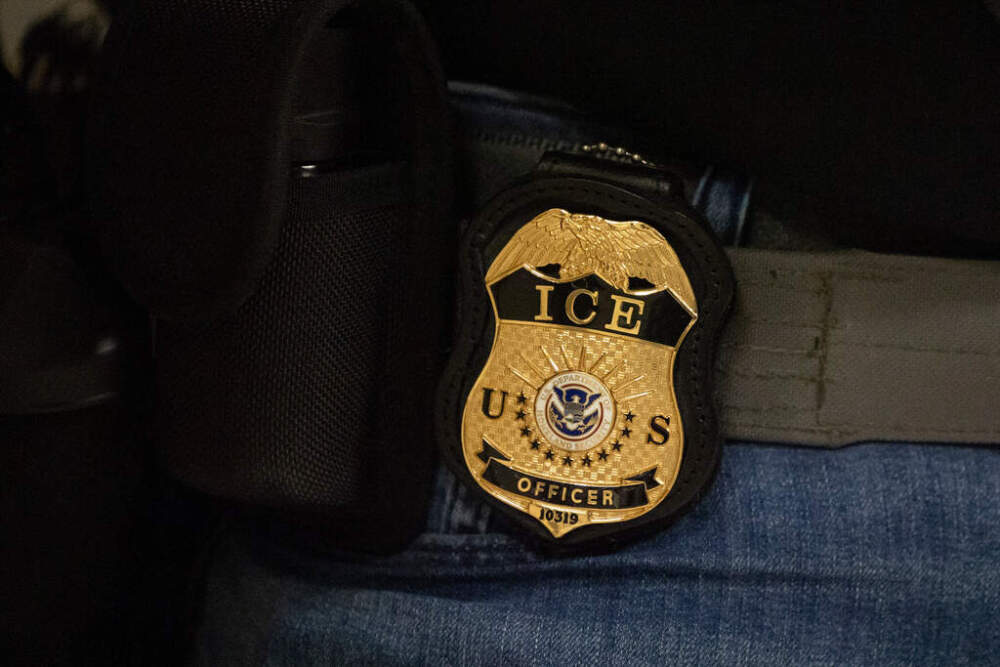 A federal agent wears an Immigration and Customs Enforcement badge in New York, June 10, 2025. (AP Photo/Yuki Iwamura, File)