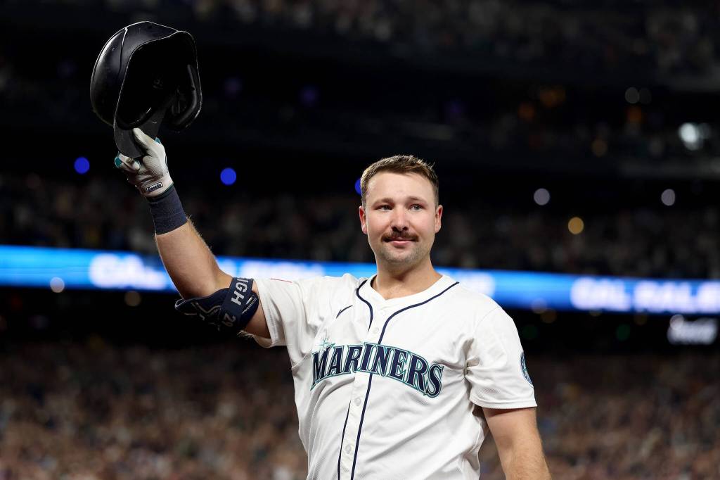 Cal Raleigh of the Seattle Mariners celebrates his solo home run, his 60th of the season, during the eighth inning against the Colorado Rockies at T-Mobile Park on Sept. 24, 2025, in Seattle. (Steph Chambers / Getty Images / Tribune News Services)