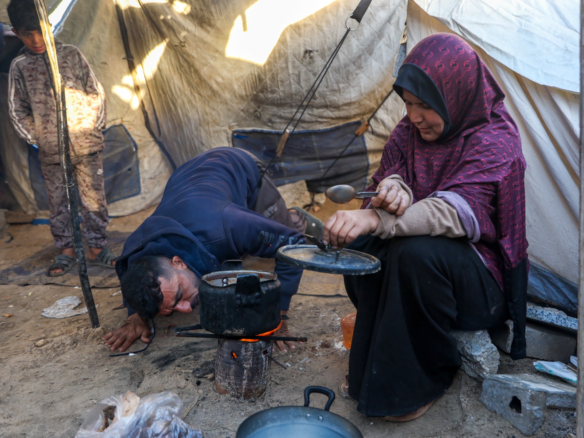 ‘Life covered in soot’: Gas shortage forces Gaza families to cook over wood | Israel-Palestine conflict News