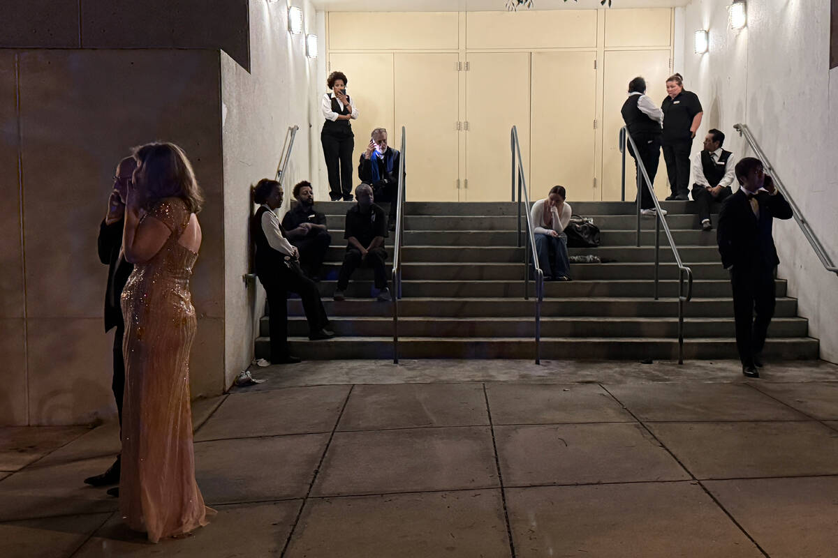 Attendees and hotel workers evacuate after an incident at the Washington Hilton during the Whit ...