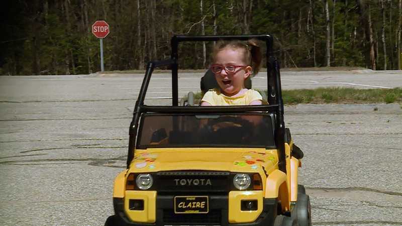 College students gift adaptive car to girl with spina bifida