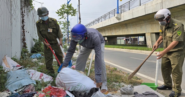 Ho Chi Minh City resident fined over $28, forced to clean up illegal trash dump