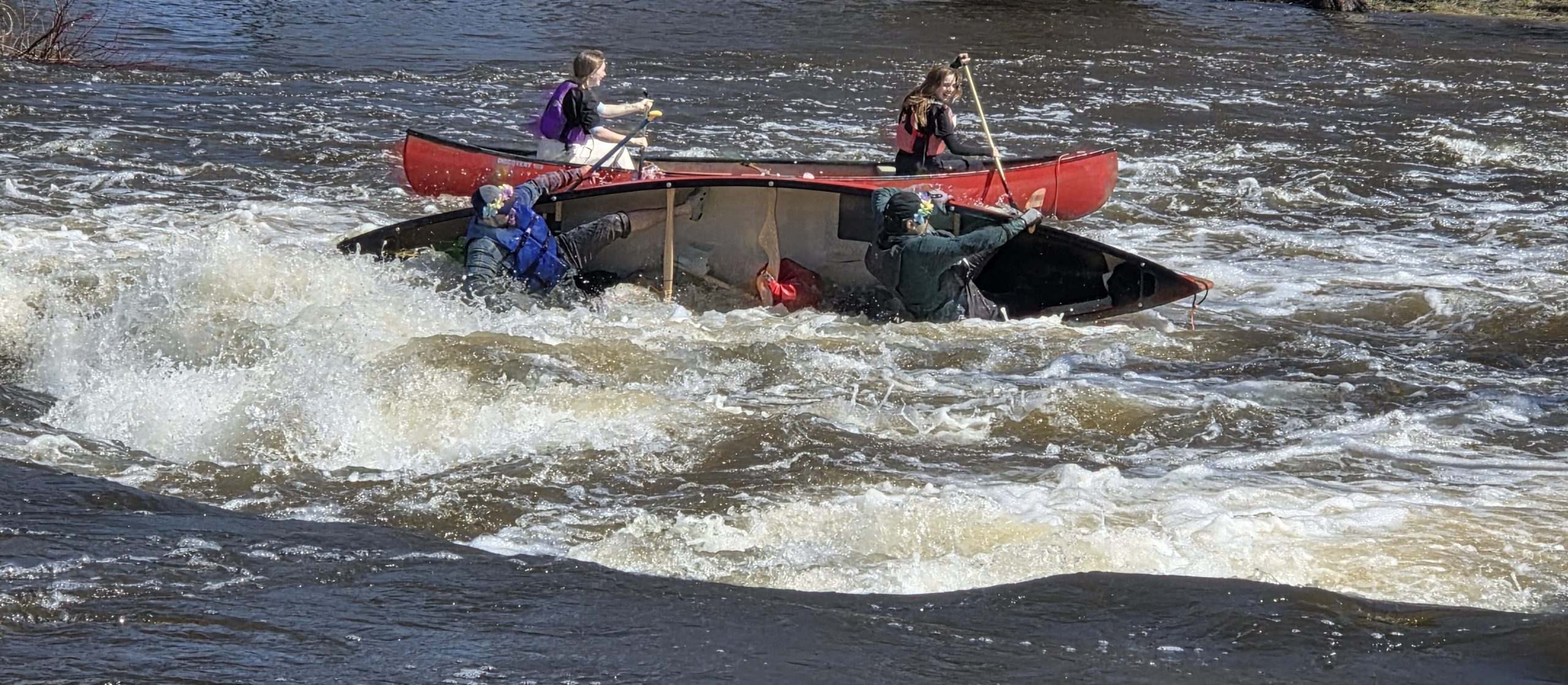 Kenduskeag Stream Canoe Race: Paddlers navigate the rapids