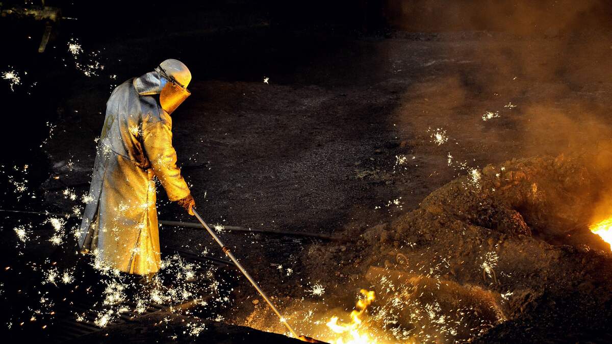A man working at the blast furnace of the ArcelorMittal steel plant in Grande-Synthe, northern France