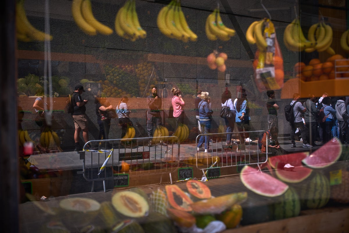 Migrants rush to apply under Spain’s new mass legalization program