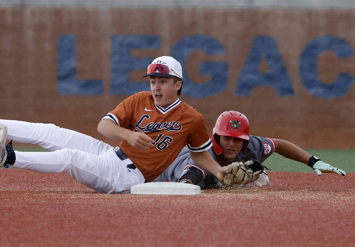 Arbor View's Colton Christman, right, tagged out by Legacy's Bringham Stosich (16) at ...