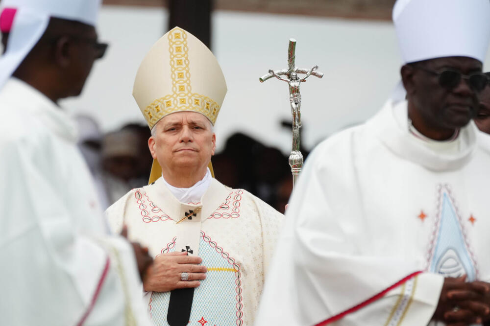 Pope Leo XIV arrives in procession to celebrate Mass at Yaounde Ville Airport, Cameroon, Saturday, April 18, 2026 on the sixth day of his 11-day pastoral visit to Africa. (AP Photo/Andrew Medichini)