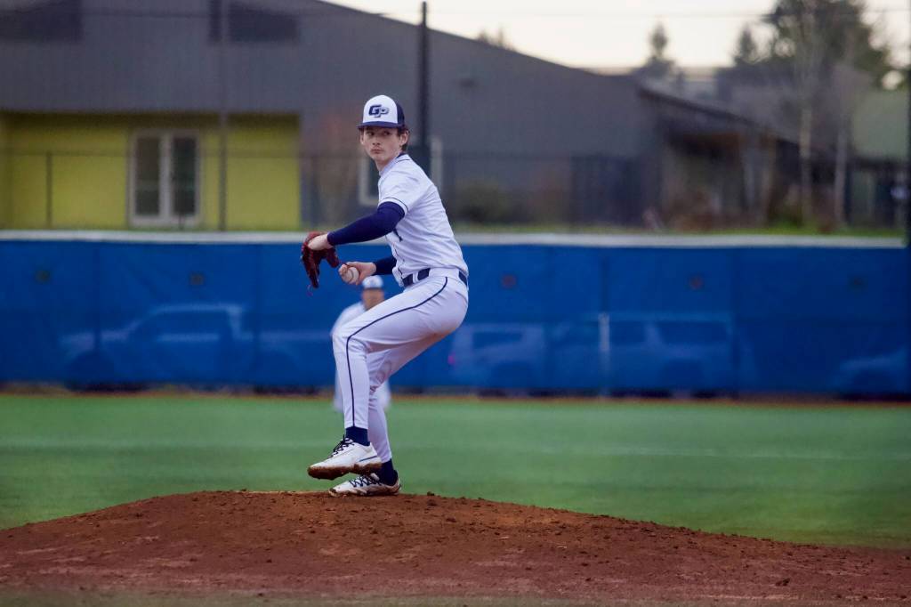 Glacier Peak junior Ryan Sundby winds up for a pitch during the Grizzlies 6-2 win against Shorewood at Meridian Park Field on March 16, 2026. (Joe Pohoryles / The Herald)