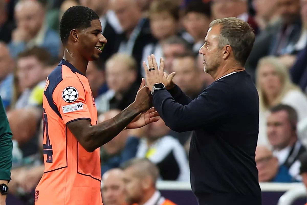 Flick congratulates Rashford.