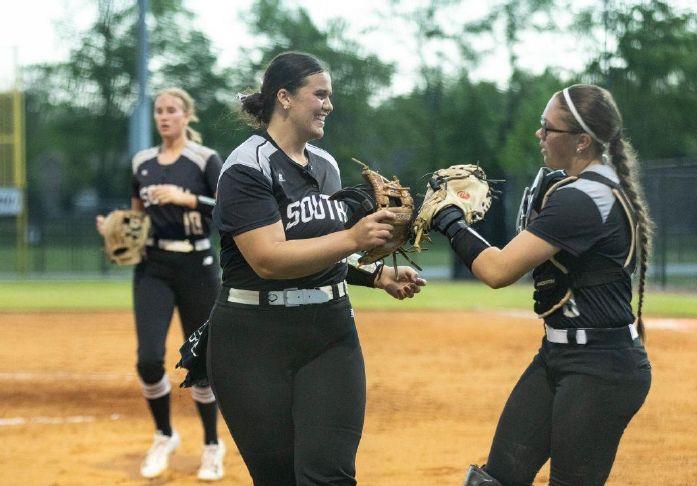 SLIDE SHOW: Spartans down Purples in five innings