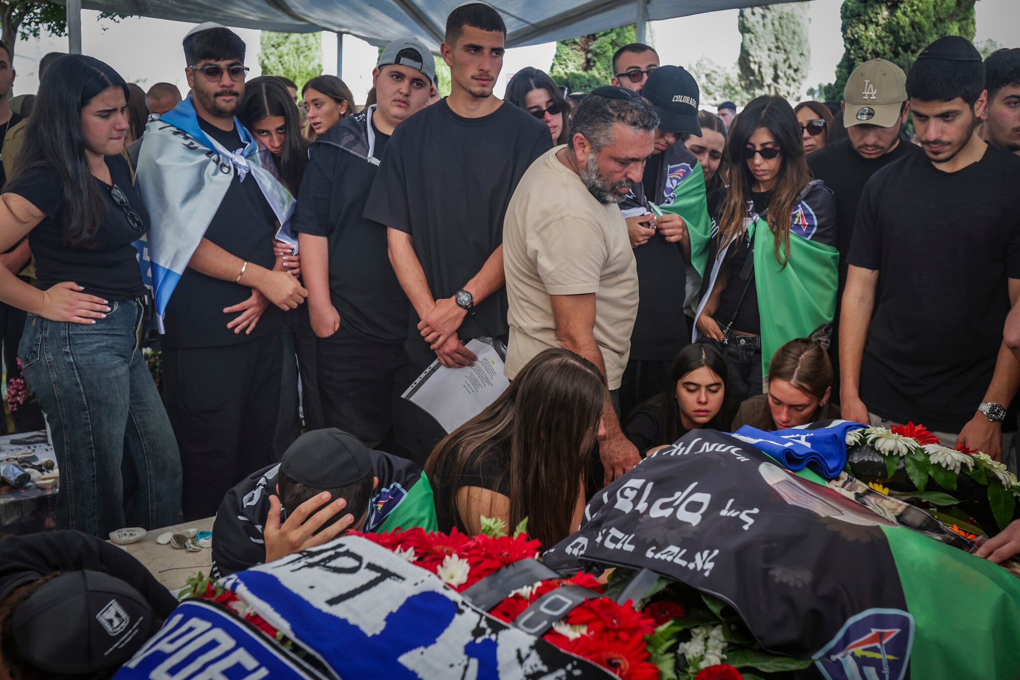 Slain soldier’s girlfriend says at funeral that she saw his death in Lebanon in real time