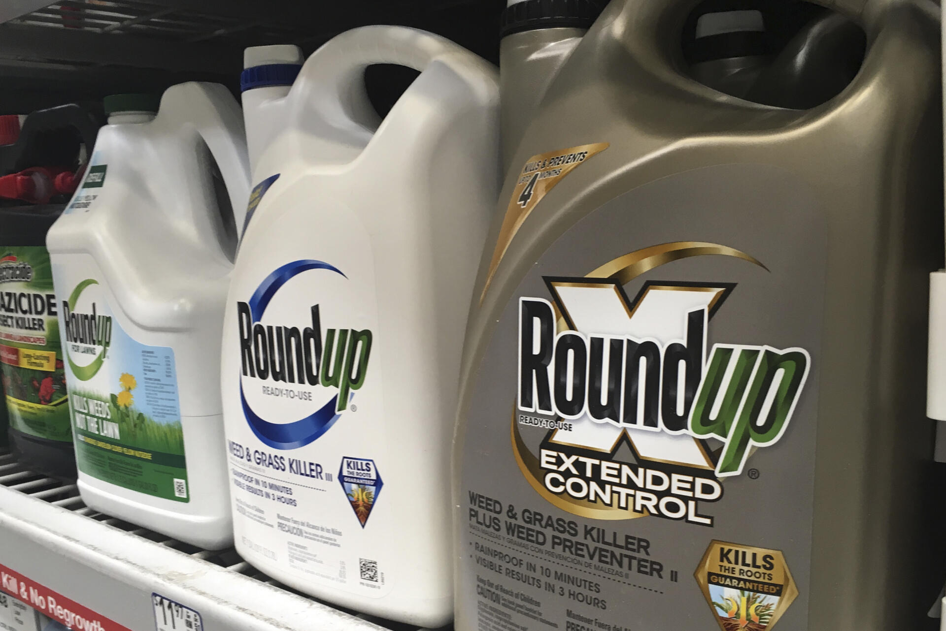 Containers of Roundup are displayed on a store shelf in San Francisco. (Haven Daley/AP)