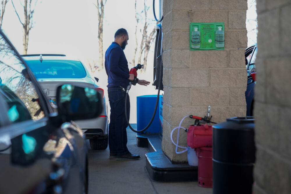 Gas is pumped at a Costco store, Wednesday, April 8, 2026, in Niles, Ill. (AP Photo/Erin Hooley)